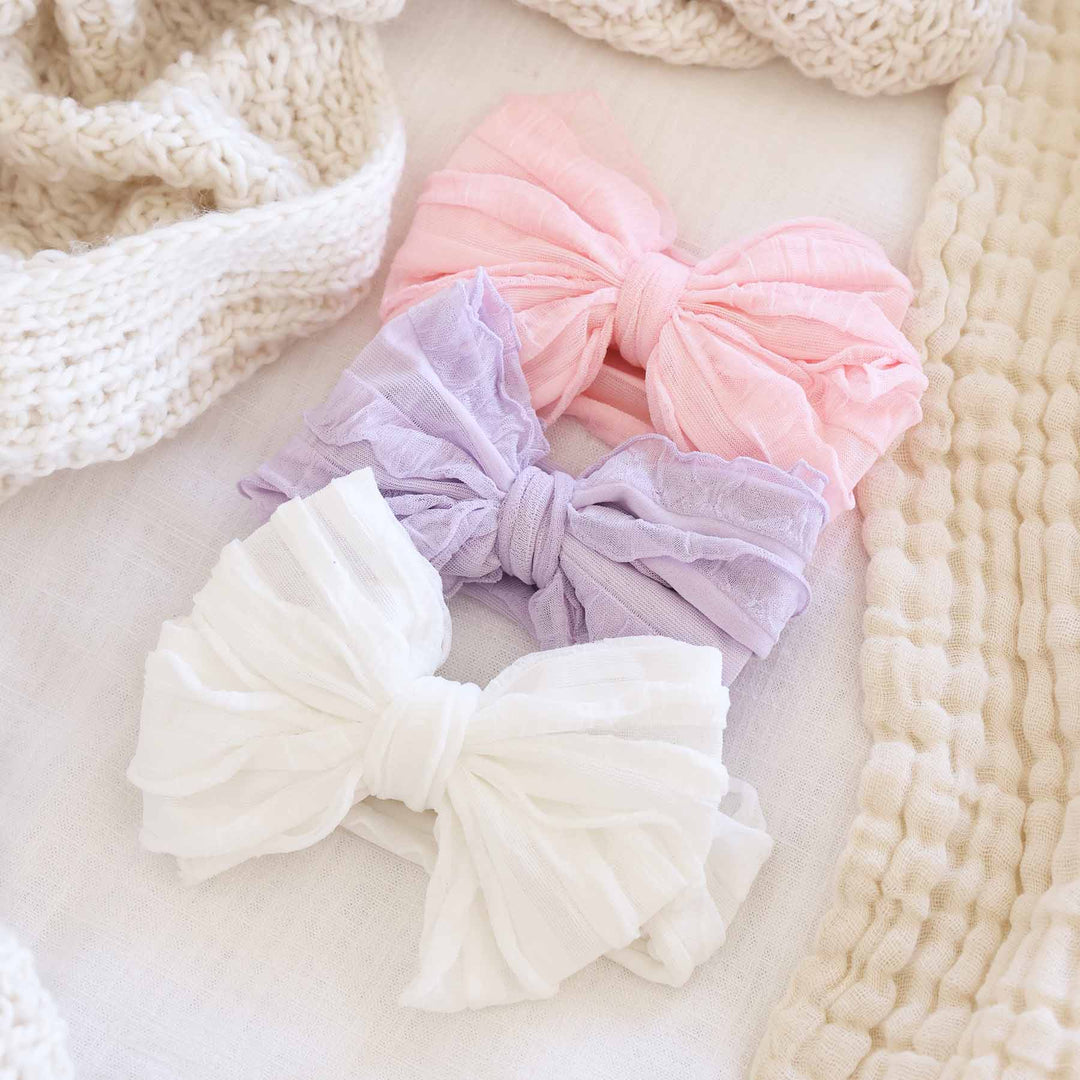 Large Ruffle Knit Bow: Barely Pink
