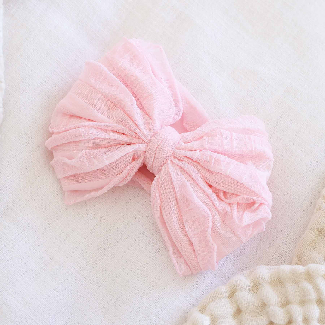 Large Ruffle Knit Bow: Barely Pink