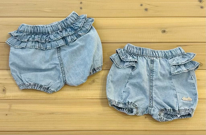 Pale blue short in denim with ruffles