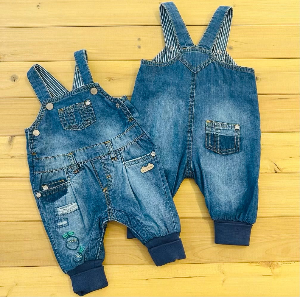 Medium blue evolutive denim overalls with faded effect