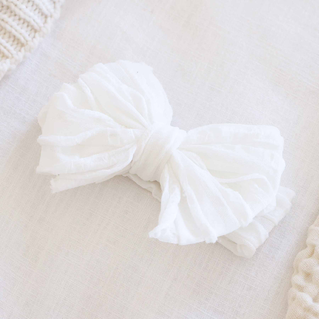 Large Ruffle Knit Bow: Barely Pink